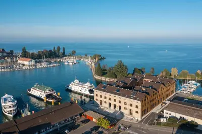 an aerial view of a harbor with boats in the water at Business Appartement 2 am Bodensee in Romanshorn
