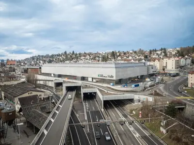 a view of a city with a building and a highway at Klara 1031 - Olma, Spital, Uni St- Gallen in St. Gallen