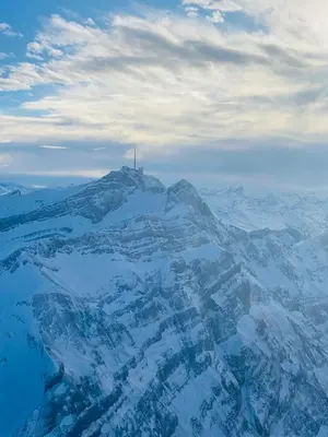 a mountain with a cross on top of it at Ferienwohnung in Stein AR in Stein
