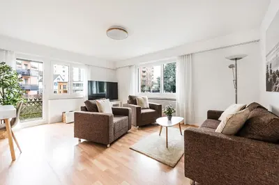 a living room with two couches and a table at SOHO 13 !Gratis Parken, Free Parking! in Kreuzlingen