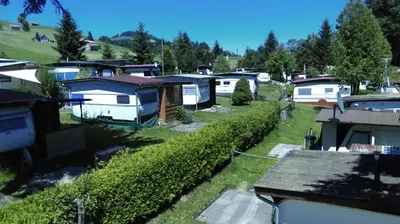 an aerial view of a group of houses at Pilger-Hüttli - Blockhaus in Schönengrund