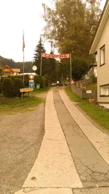 an empty road with a sign that reads emergency at Pilger-Hüttli - Blockhaus in Schönengrund