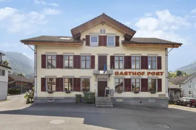 a building with the name of a castleopher post at FENUS Grabs Gemütliche Ferienwohnung SGT06 in Grabs