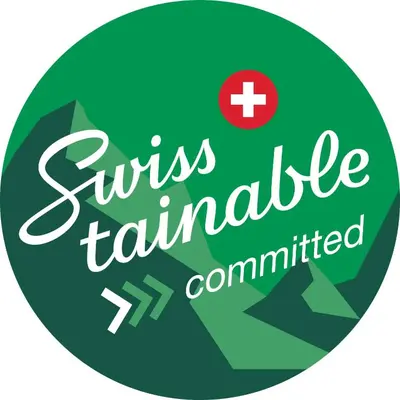 a green sign with the words nurses ambulance committed at b_smart motel Amriswil in Amriswil