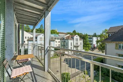 a balcony with a view of a city at Klara 1022 - Olma, Spital, Uni St- Gallen in St. Gallen