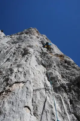 a person on the side of a rocky mountain at Ferienwohnung Halden in Unterwasser