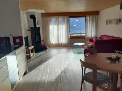 a living room with a couch and a table at Ferienwohnung Halden in Unterwasser