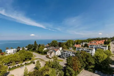 a balcony with a view of the ocean at Seenähe 300 Meter 126 qm Wohnfläche 6 Betten in Rorschacherberg