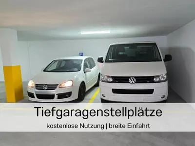 two cars parked in a parking garage at Ferienhausträume - ebenerdiges Bodensee Apartment mit Garten und großer Terrasse mit Grill in Kreuzlingen