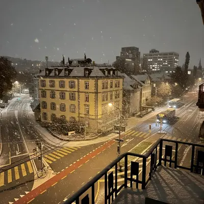 a view of a city street with a building at Zentrales Apartment St Gallen an der Olma in St. Gallen