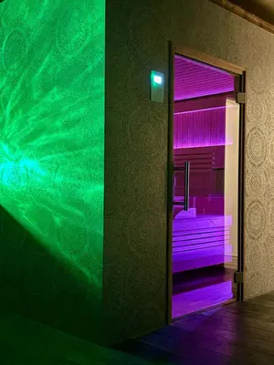 a room with a window with purple and green lights at Private SPA Seeliebe - Ihre Ruheoase in Amriswil