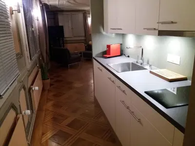 a kitchen with a sink and a counter top at Hotel Garni Frohsinn in Uttwil