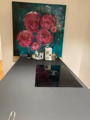 a painting of pink flowers on a wall at Mountain View luxury up to four persons in Diepoldsau
