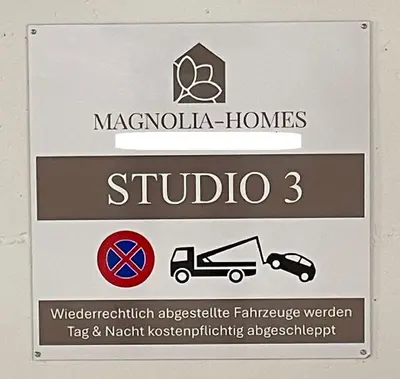 a sign that says macushima homes and studio three at DESIGN-STUDIO 3 !Gratis Parken, Free Parking! in Kreuzlingen
