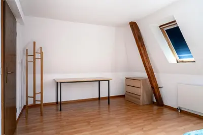 a room with a table and a window at Private Apartment in Degersheim