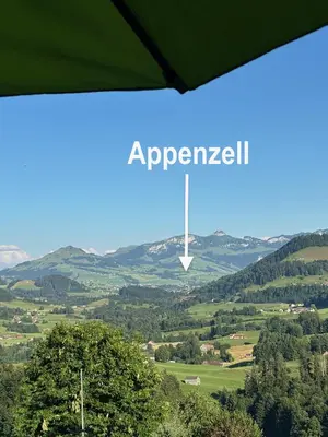 a sign with the word agreement in the middle of a valley at Appenzellerland, 2 Zimmer Ferienwohnung mit Aussicht in Haslen