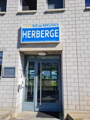 a sign over the entrance to a herpes outbreak hospital at Herberge Seeperle Bistro Rorschach in Rorschach