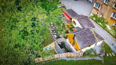 an aerial view of a house with a train at Zum Wöschhüsli mit Sauna in Rheineck