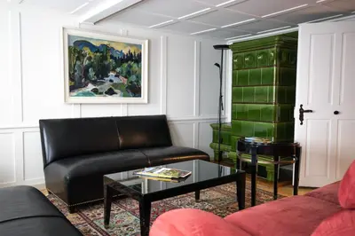 a living room with a couch and a table at Wohnhaus Münzmühle in Appenzell in Appenzell
