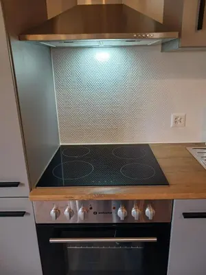 a stove top oven in a kitchen at 2,5 Zimmer Ferienwohnung in Bühler, Nähe Appenzell in Bühler