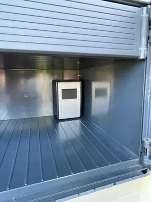 a view of a room with a microwave in a building at DESIGN-APARTMENT 2 !Gratis parken, Free Parking! in Kreuzlingen