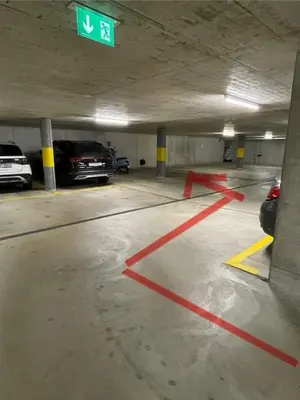 a parking garage with cars parked in it at DESIGN-APARTMENT 2 !Gratis parken, Free Parking! in Kreuzlingen