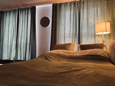 a microwave oven with its door open on a counter at Modern Apartment St Gallen Zentrum in St. Gallen