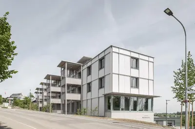an apartment building on the side of a street at Gästehaus Meiersegg - HotelFlawil in Flawil