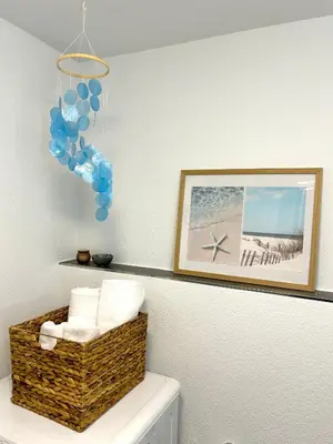 a basket sitting on top of a toilet in a bathroom at Klara 1011 - Olma, Spital, Uni St- Gallen in St. Gallen