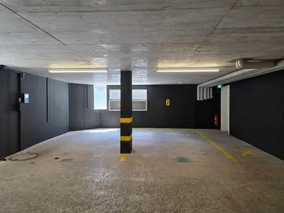 an empty room with a pole in the middle at Hotel Salvi in Kreuzlingen