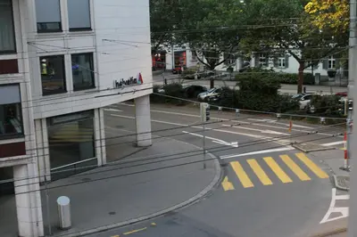 a yellow building with a kryptonian sign on it at Kränzlin Hotel in St. Gallen