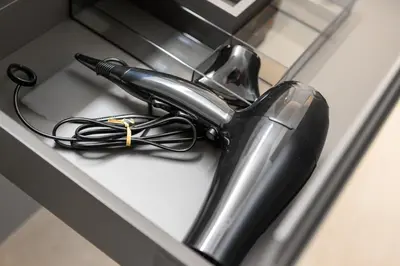 a black cord is sitting on top of a drawer at BLIV Grosszügiges Altbaujuwel im Zentrum in St. Gallen