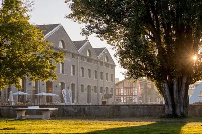 a building with a bench in front of it at LAKE-APARTMENT's in Romanshorn