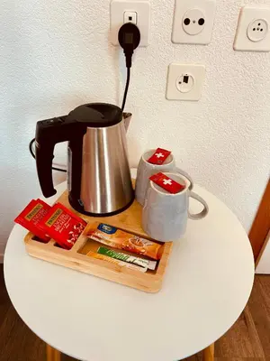 a coffee maker on top of a table at Romantic Room, Private Bathroom and Great View in Heiden