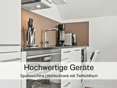 a kitchen with a sink and a counter top at Ferienhausträume Bergstrasse Bodensee - inkl Tiefgarage, Garten und Dachterrasse in Kreuzlingen