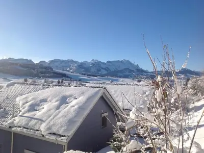 a snowy roof of a house with snow on it at Apartment Kleines Loft by Interhome in Gais