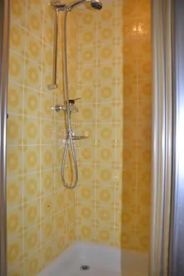 a shower in a bathroom with a tub at Apartment Sutter in Brülisau bei Appenzell by Interhome in Brülisau