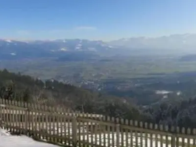 a wooden fence with a view of a valley at Apartment Rheintalblick by Interhome in Oberegg