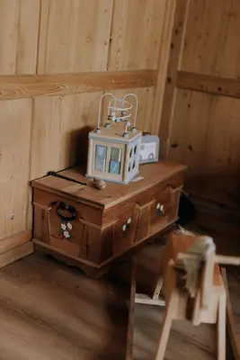 a small table with a machine on top of it at 4 bedroom house for 8 guests in Brülisau