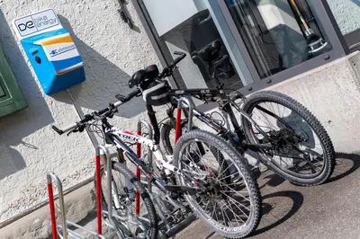 two bikes parked on the side of a building at Hotel Garni Rössli in St. Gallen