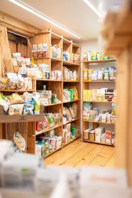 a grocery store aisle with shelves of food at Apartment Hof Bommes by Interhome in Gais