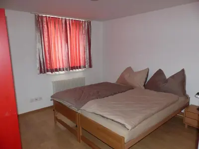 a bedroom with a bed in a room at Apartment Moderne FeWo by Interhome in Appenzell