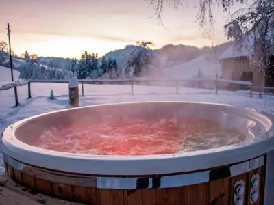 a large tub filled with red substance in the snow at Apartment Vordere Au by Interhome in Schwellbrunn