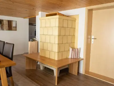 a table with a stack of boxes on it at Holiday Home Hörli by Interhome in Sankt Peterzell
