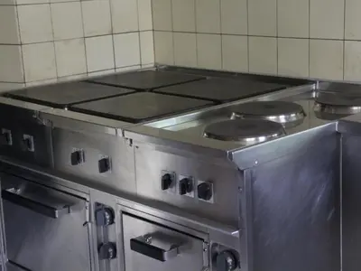 a large stainless steel stove top in a kitchen at Holiday Home Frohheim by Interhome in Sankt Peterzell