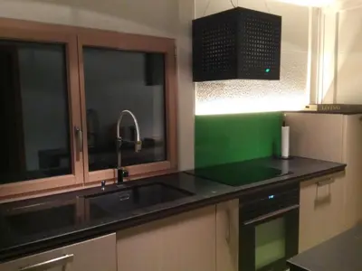 a kitchen with a sink and a counter top at Holiday Home MECK-HEI by Interhome in Wildhaus