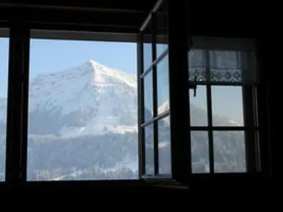 a view of a mountain from a window at Holiday Home Obere Laui by Interhome in Nesslau