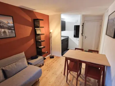 a small living room with a table and a couch at Apartment Modern kompakt Speer by Interhome in Alt Sankt Johann