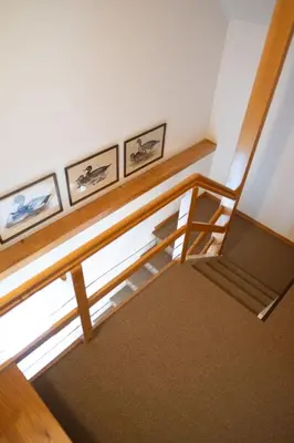 an overhead view of a staircase in a room at Holiday Home Haus am Schwendisee by Interhome in Wildhaus