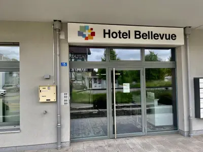 an entrance to a hotel building with the door open at Hotel Swiss Bellevue in Kreuzlingen